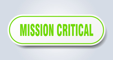 mission critical sign. mission critical rounded green sticker. mission critical