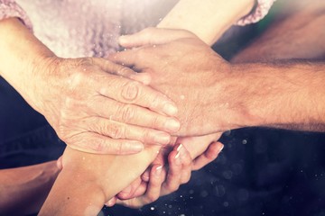 Man and Woman Hands Holding an Old Woman's Hands