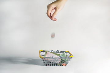 hand with shopping cart