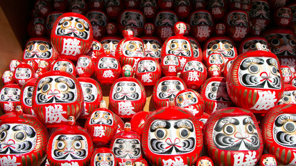 Daruma dolls, good-luck doll with Japanese character meaning "Win" at Katsuo-ji temple, Osaka, Japan