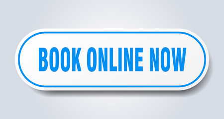 book online now sign. book online now rounded blue sticker. book online now