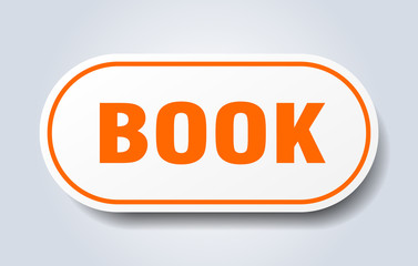 book sign. book rounded orange sticker. book