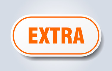 extra sign. extra rounded orange sticker. extra