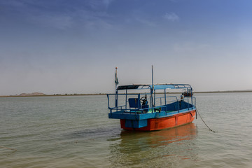 old fishing boat on water