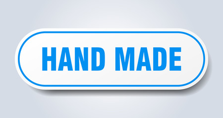 hand made sign. hand made rounded blue sticker. hand made