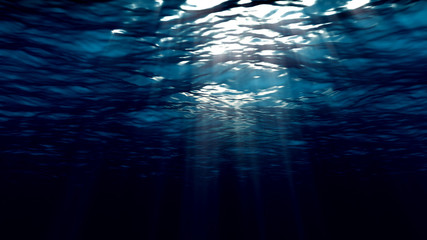 Rays of light passing through the sea surface