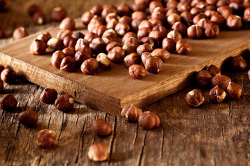 Bunch Of Hazelnuts On A Wooden Board