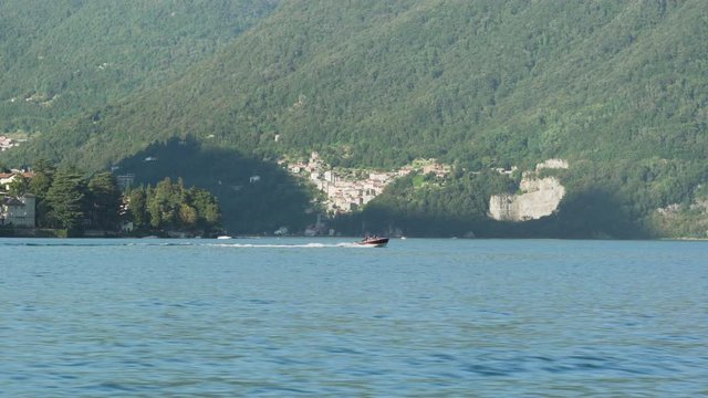Speedboat on Lake Como navigating from Urio to Torno