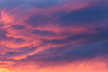 Naklejka na ściany i meble Purple colored cloud during sunrise time.