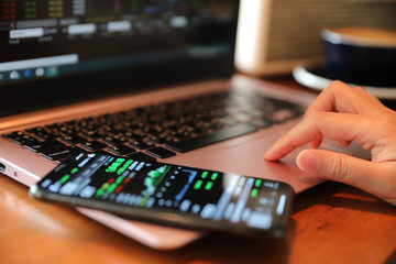 Woman hand working at coffee shop hand on keyboard with close up