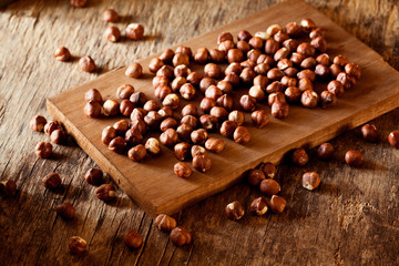 Hazelnuts On A Wooden Board