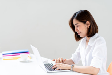 Happy business woman working in a office