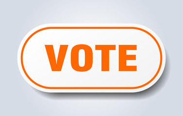 vote sign. vote rounded orange sticker. vote