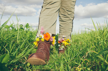flowers in boots on sunny days