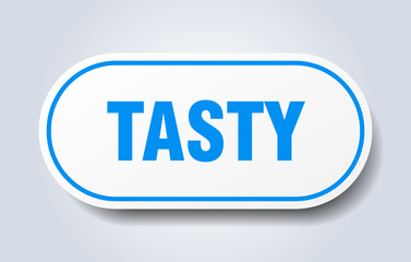 tasty sign. tasty rounded blue sticker. tasty