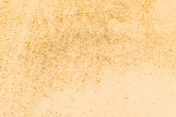 Beautiful closeup textures abstract colorful dark black white yellow tiles floor granite and bright gold wall pattern background and wallpaper.