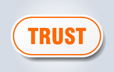 trust sign. trust rounded orange sticker. trust