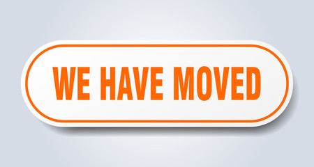 we have moved sign. we have moved rounded orange sticker. we have moved