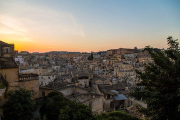 Fototapeta premium Panorama tramonto Sassi di Matera, città della cultura - Italia