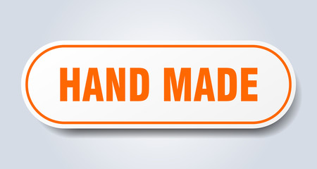 hand made sign. hand made rounded orange sticker. hand made
