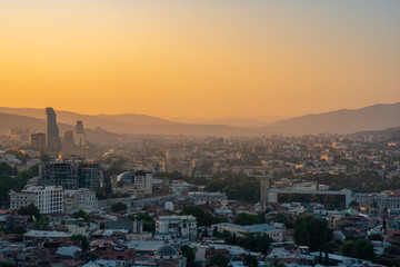 Fototapeta na wymiar Areal view of Tbilisi City in the evening. Beautiful Place to travel.