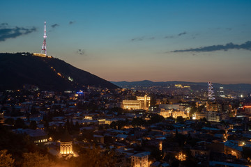 Night view of Tbilisi, TV tower and other landmarks. Georgia.