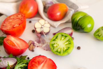 Fototapeta na wymiar fresh salad with tomatoes and herbs 