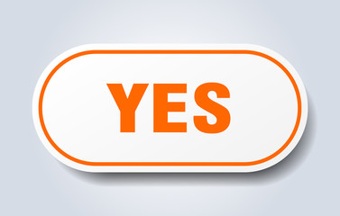 yes sign. yes rounded orange sticker. yes