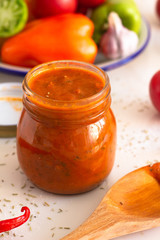 homemade tomato sauce in glass jar