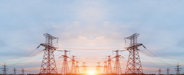 High voltage power lines in the winter. Thermal power plant. High-voltage transformer substation.