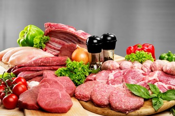 Fresh Raw Meat Background with vegetables