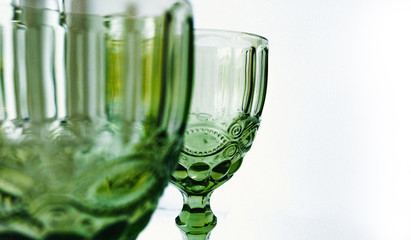 gren glass of wine on white background