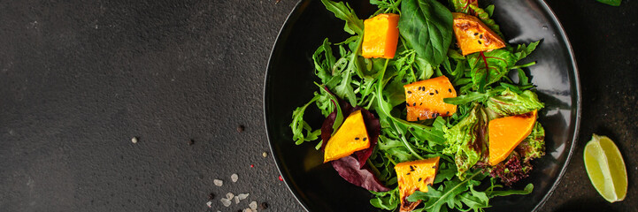 healthy salad pumpkin, mix leaves (tasty snack, vitamins, wholesome food) menu concept. food...