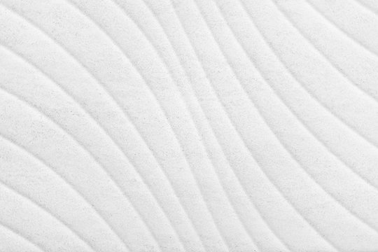 White low contrast abstract elegant waves textured background. Light backdrop.