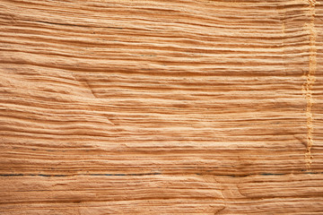 Naklejka premium Sandstone cliffs have parallel lines etched into them by weather erosion in Canada's Madeleine Islands.