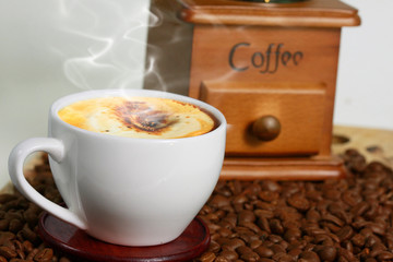 Coffee cup and coffee beans