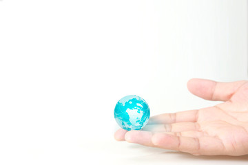 Globe ,earth in hand, holding our planet glowing. Earth image provided by Nasa