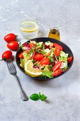 diet lunch fresh vegetables salad from tomato, spinach, lettuce, onion