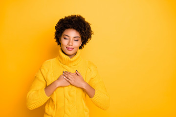 Good day emotion mood concept. Photo studio shot of one charming tranquil pretty cute girl feeling kindness trust and care inside isolated vivid color shine background copyspace