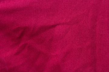 Texture of crease on red fabric