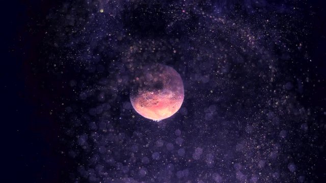 Rotation of tiny planet around its axis. Sparkling silver space gloss-like dust swirling randomly and glittering. Bokeh particles on the forefront.