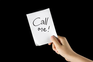 Hand holding Call me paper note