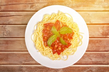 Delicious pasta on white plate on  background