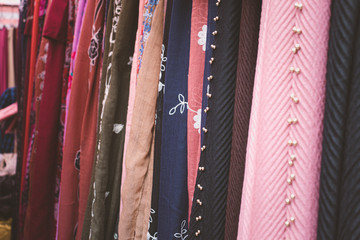 colorful clothes on hangers