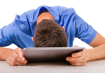 Man sleep with a Tablet