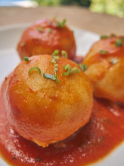 Pelones buns, a traditional Venezuelan meal based on cornmeal and ground meat with tomato sauce. Served at the tables of Venezuelan homes