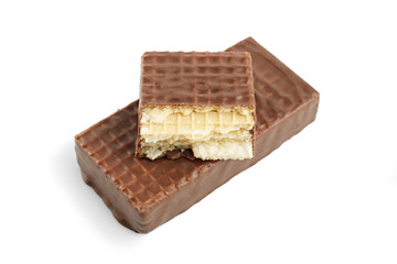 Chocolate wafer on white background. Milk chocolate. Dessert.