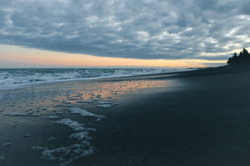 New Zealand beach at sunset