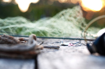 fishing tackle and accessories on wooden table
