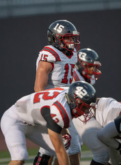 Great action photos of football players making amazing plays during a football game